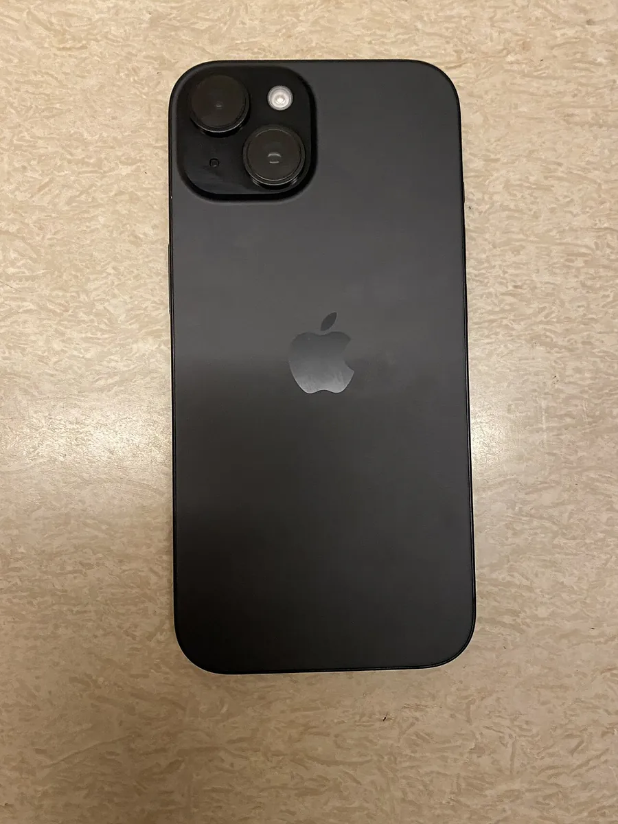Back of a black iPhone 15
