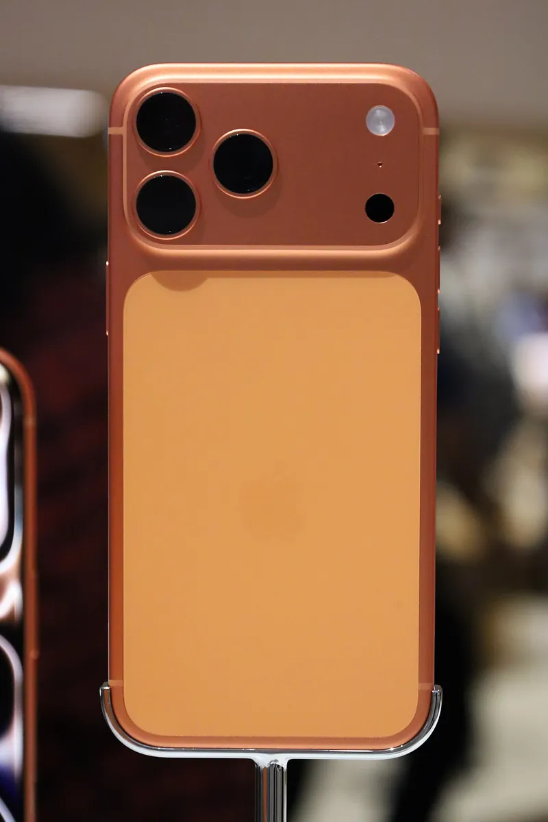 Back of an iPhone 17 Pro Max in Cosmic Orange